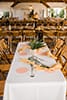Boho wedding table and bamboo chairs rentals